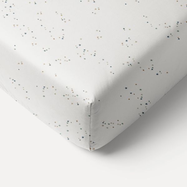 Drap housse en coton blanc cassé avec étoiles 90x200 cm par Petite Amélie 